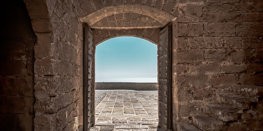 An ancient fort doorway at a famous place near Bhudargad Fort, showcasing old architecture.
