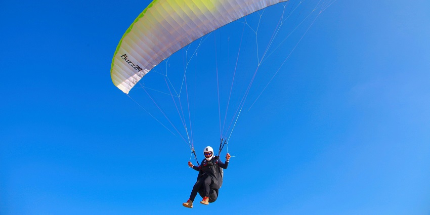 Soaring high Paragliding is a great activity to experience with your loved ones this year.
