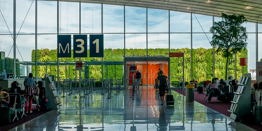 Some tourists checking out from a terminal at Paris Charles de Gaulle Airport in Europe.