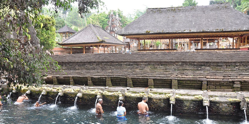 Experience a spiritual cleansing at a sacred Balinese water temple.
