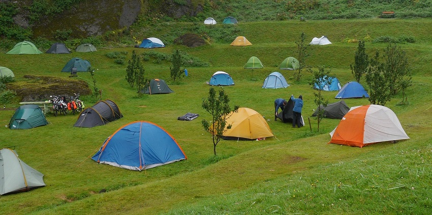 View of multi coloured tents in the Pench national park, offering a rejuvenating experience