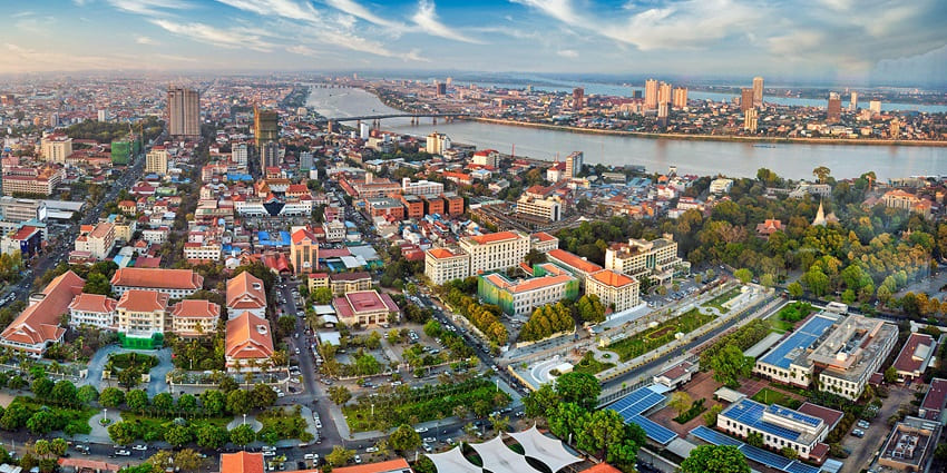 A scenic view of Phnom Penh's riverside, a wonderful tourist place in Cambodia for a honeymoon.