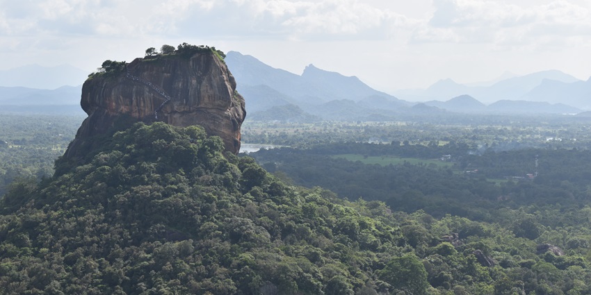A breathtaking vista justifying the serene location of Pidurangala Rock in Sri Lanka.