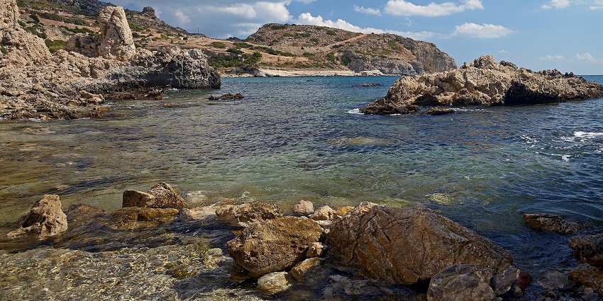 Pirates Bay is among the top bikini beaches in the world with tranquil waters, lush cliffs, and an untouched shoreline.