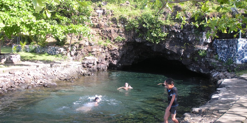 The serene Piula Cave Pool is one of the best places to visit in American Samoa.