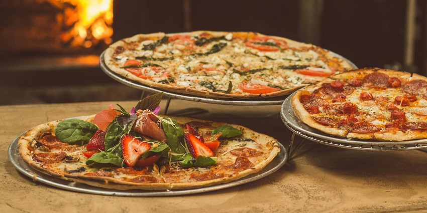 A popular eatery serving handcrafted pizzas with fresh ingredients and a variety of toppings.