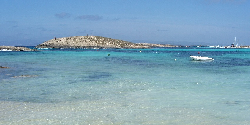 Nude beaches in Europe with soft white sand, azure waters, and stunning views