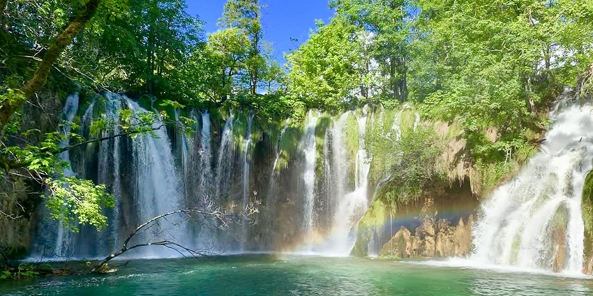 A breathtaking series of cascading turquoise waterfalls in a UNESCO-listed national park.