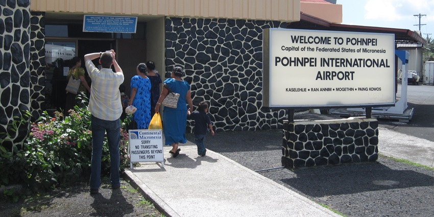 A board at the entrance of Pohnpei International Airport in Micronesia welcomes travellers.