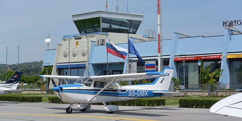 A smooth, wide runway amidst the rugged terrain of the mountains all set to welcome the day