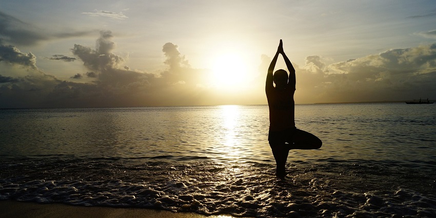 Stretch, breathe, and relax, a must-try among the many things to do in Arugam Bay.