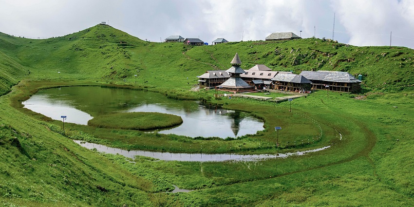 Scenic view of Prashar lake, a floating island, and surrounded by mountains
