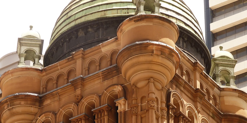 An image of the Queen Victoria Building, showcasing beautiful architecture and spacious interiors.
