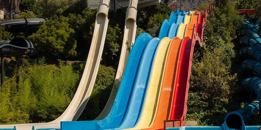 A stunning water park in Kurukshetra featuring tall water slides and crystal-clear pools.