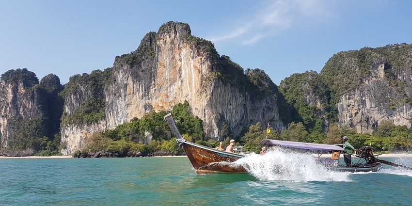 Railay Beach is famous among tourists for its scenic beauty and tropical climbing.