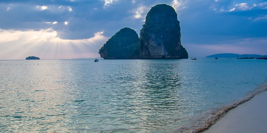 Beaches in Asia offer stunning limestone cliffs and turquoise waters, creating a picturesque paradise in Thailand.