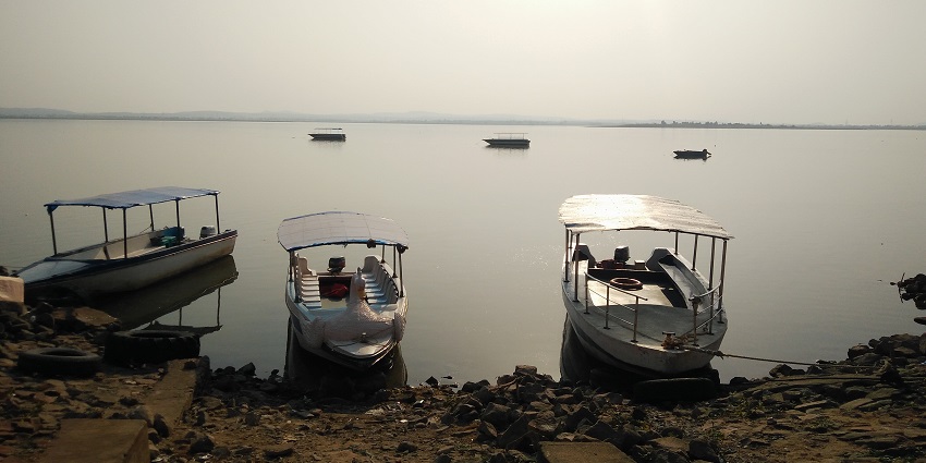 Image of boating at Ramappa Lake between different islands located in Warangal