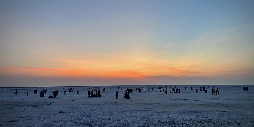 An image of a large circular tent set up in the white desert of India, during the Rann Utsav festival, one of the most unique festivals in India.