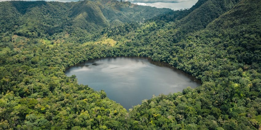 A scenic glimpse of Yeak Laom Lake in Ratanakiri, a major attraction of the region.
