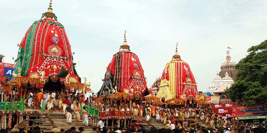 An image showing the grand procession of chariots during the Puri Ratha Yatra festival.