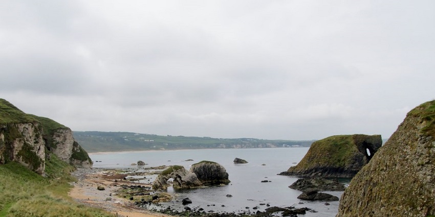 A serene view of Elephant Rock Beach, a tourist destination near Arugam Bay Beach.