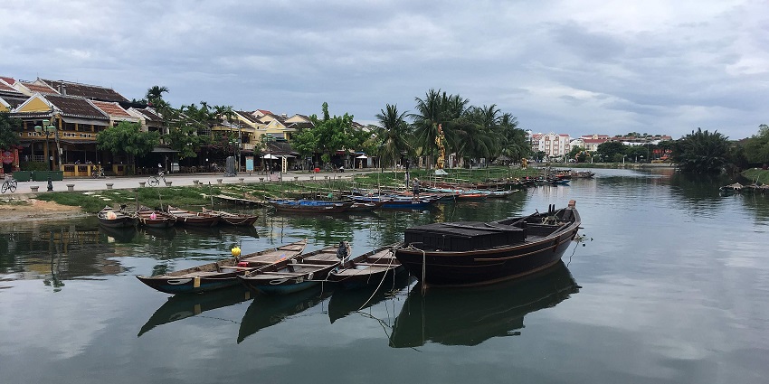 a peaceful evening by the river at the Hoi An night market, watching the lanterns glow.