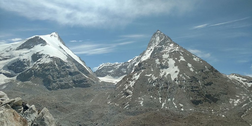 Reo Purgyil Peak on the right and the snow-covered peak of Mount Leo Purgyil on the left