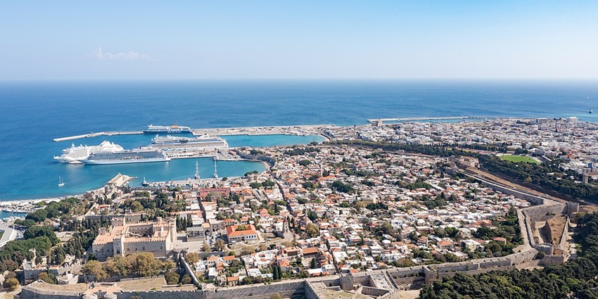 A stunning island boasting medieval architecture, golden beaches, and crystal-clear waters