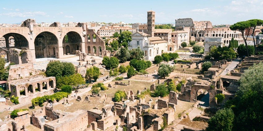 The Rome travel guide highlights an ancient Roman centre with temples, arches, and historical ruins.