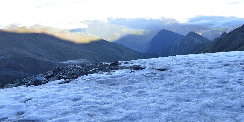 A serene view of the famous Roopkund Lake, one of the scenic frozen lakes in India.