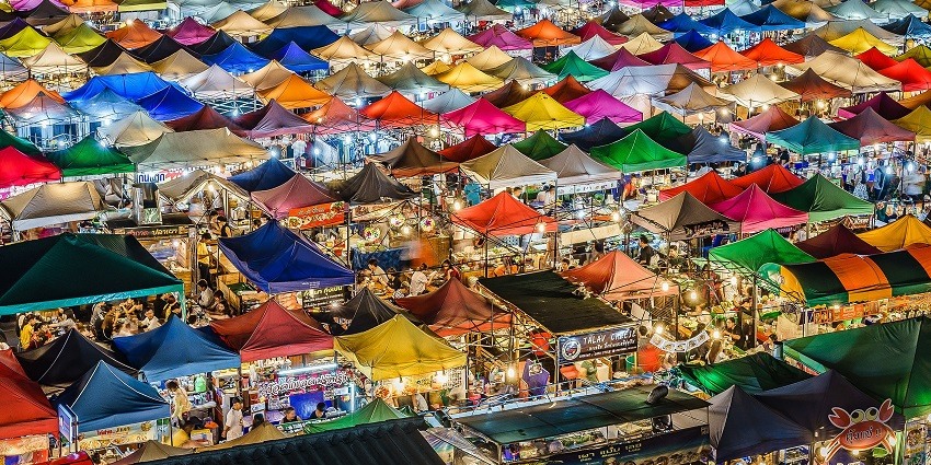 The vibrant Ratchada Train Night Market in Bangkok is perfect for shopping in Thailand