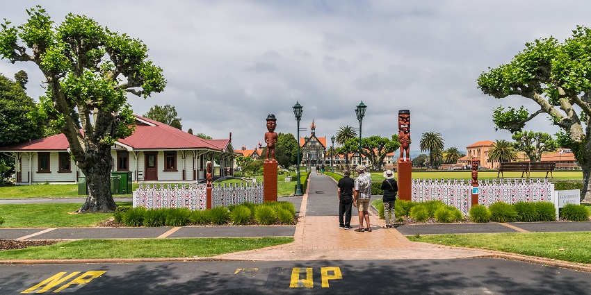 A simple daytime view of Rotorua city with a clear sky, a place to visit near White Island.