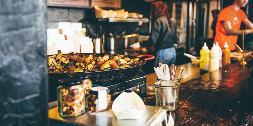 Open-air dining spot with diverse Thai street food and international cuisine