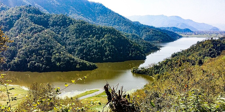 Rupa Lake, a peaceful retreat in Nepal, perfect for boating, birdwatching, and relaxation.