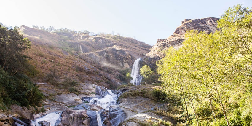 An image of Rupse Waterfall in Nepal, one of the best waterfalls in the Himalayas.