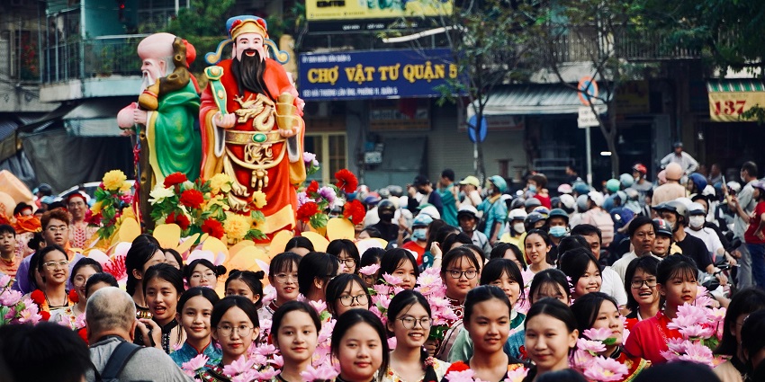 Image of Saga Dawa festival celebrations with crowds participating in a vibrant parade