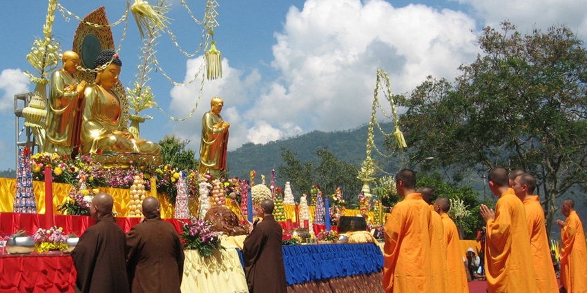 An image of the Saga Dawa Festival with monks and devotees celebrating Buddha’s birth and enlightenment.