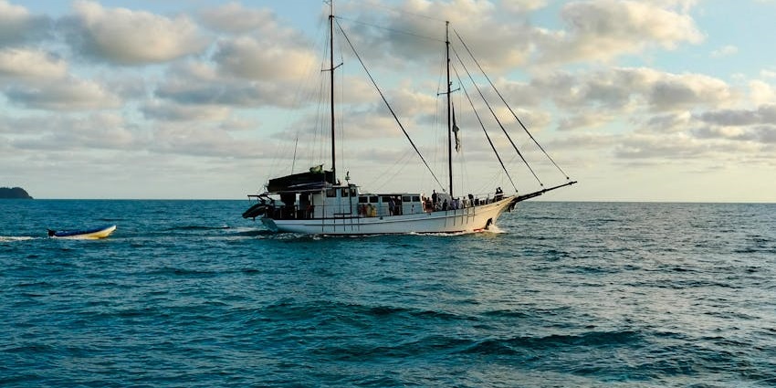 Boat sailing in Port Lincoln, Australia, set against the open sea, one of the best water sports in Australia.