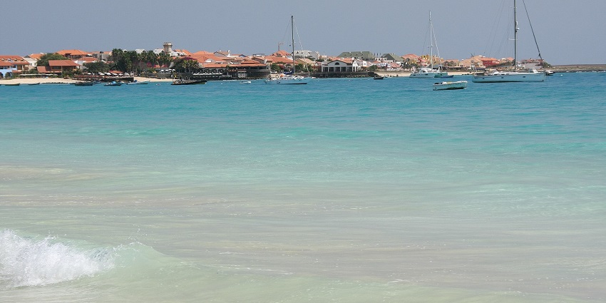 A sun-drenched island with golden beaches, turquoise waters, and a vibrant local culture.
