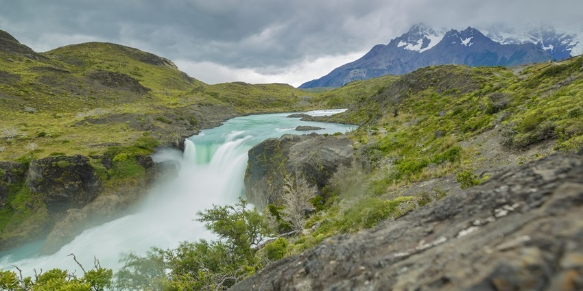 Experience the rushing waters of this Patagonian cascade in Torres del Paine National Park, among the best waterfalls in South America.