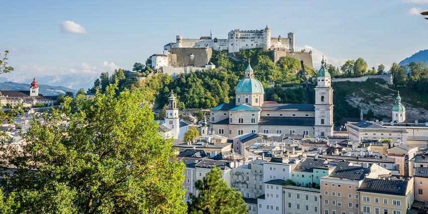 A stunning nighttime panorama of Salzburg, showcasing beautiful architecture and charm.