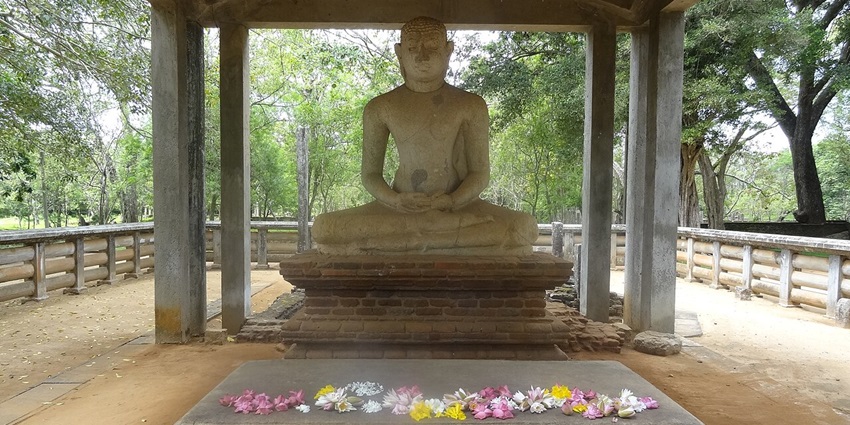 Samadhi Buddha statue in meditation at ruins, one of the places to visit in Anuradhapura