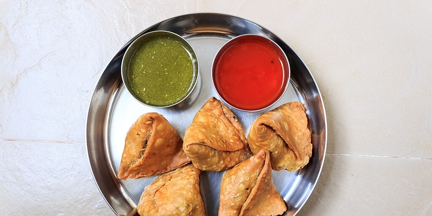 Crispy golden samosas, a popular beloved snack found across North India