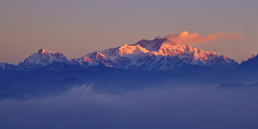A trekking trail with a view of Mount Everest, Kanchenjunga, and Lhotse.