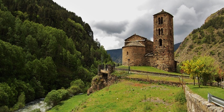 A Romanesque stone church with stunning frescoes, nestled in the Andorran mountains