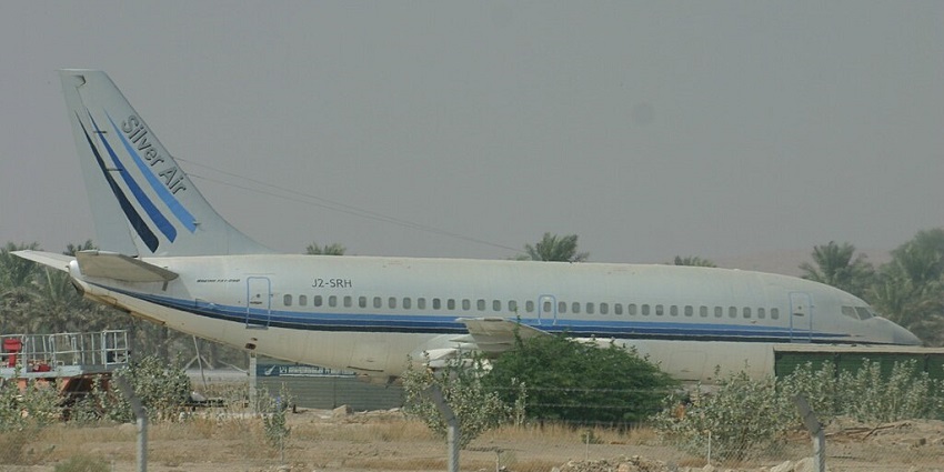 Silver Air Boeing 737 aeroplane parked at Sarh airport with blue stripes on the aeroplane
