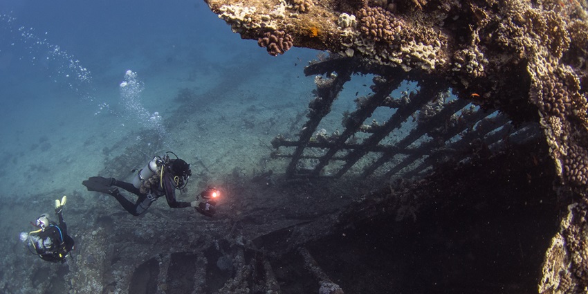 An image of a Scuba diver, deep sea diving and exploring the underwater world