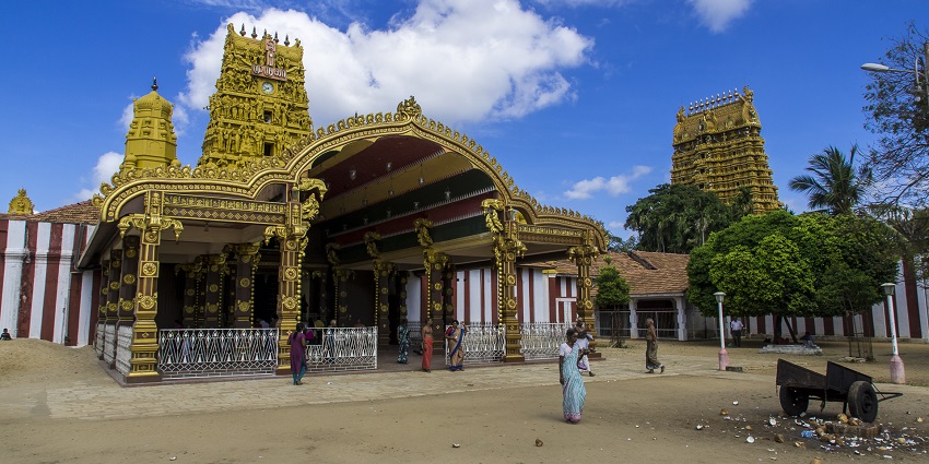 Devotees peacefully standing in a queue to seek blessing at Nallur Kandaswamy Temple