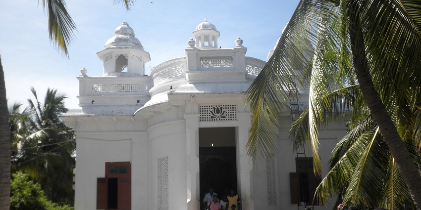 Seek blessings at the main shrine, one of the most revered rituals at Nagadeepa Purana Vihara.