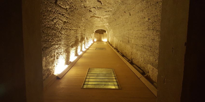 A view of the underground galleries of the Serapeum, home to massive sarcophagi of Apis bulls.